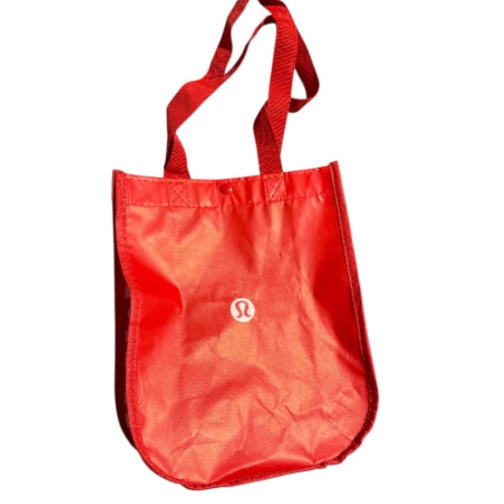 Lululemon red and white small shopping lunch tote